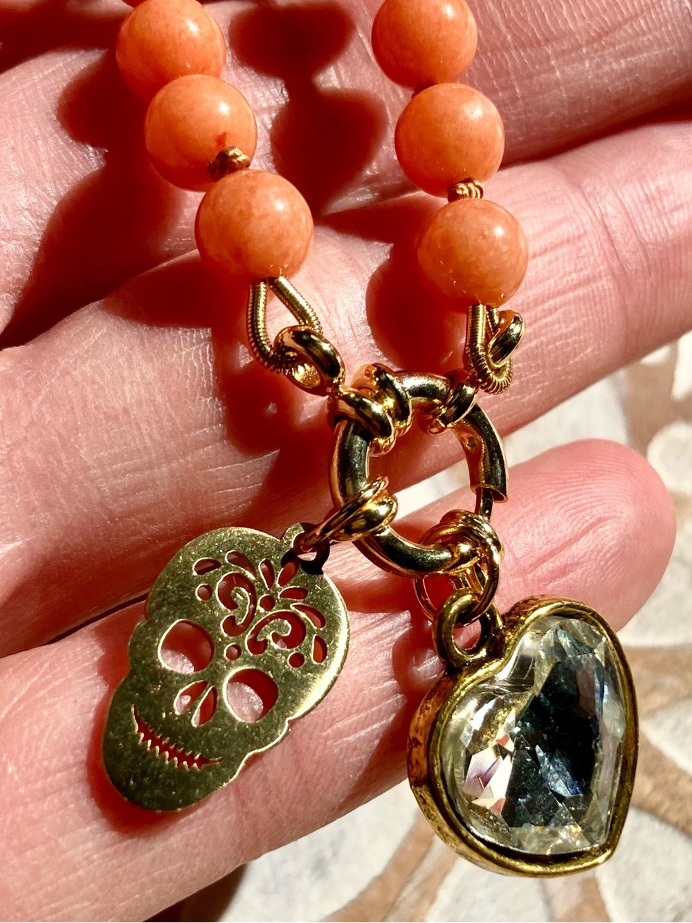 Gold-Tone Skull & Crystal Heart Necklace in Orange Beads
